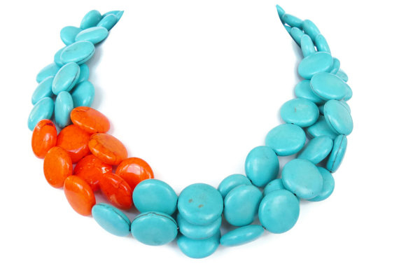 The splash of orange in this turquoise necklace is a perfect match to the cute dress pictured above. You can't get much bolder than orange and turquoise! Photo courtesy of WildflowersAndGrace on Etsy.